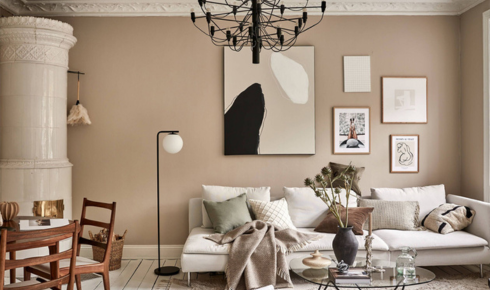 a combo of wall color, lighting and soft furnishings